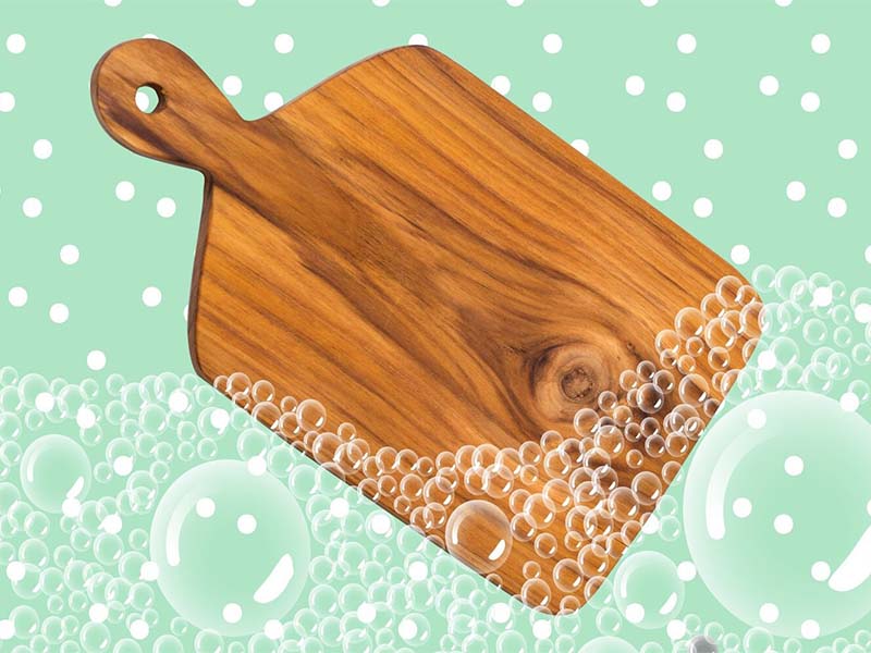 Cleaning wood cutting board with dish soap
